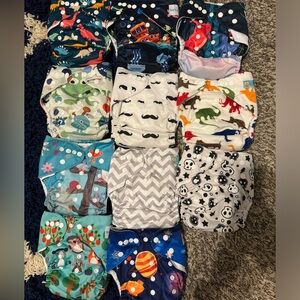 11 Assorted Cloth Diapers *BARELY USED*